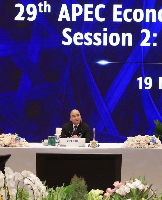 Chủ tịch nước Nguyễn Xuân Phúc dự Phiên họp thứ hai Tuần lễ Cấp cao APEC 2022. Ảnh: TTXVN
