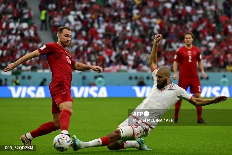 Tunisia (áo trắng) cầm hòa 0-0 trước Đan Mạch ở lượt trận đầu bảng D. Ảnh: AFP