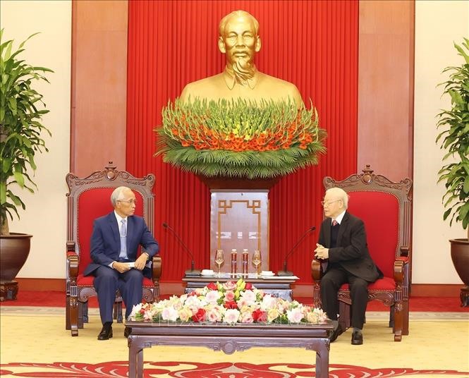 Tổng Bí thư Nguyễn Phú Trọng và đồng chí Khamphan Pheuyavong trong cuộc gặp chiều 13.12. Ảnh: TTXVN
