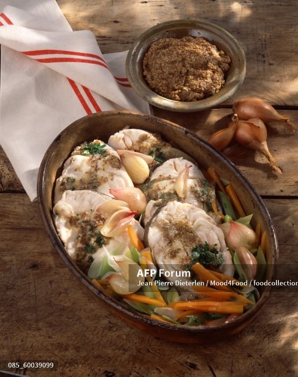 Món cá kho đặc ngon khi được kho đúng cách. Ảnh: AFP