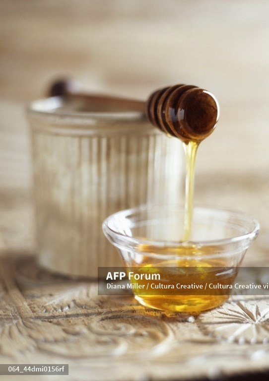Các mẹo bảo quản mật ong cực hữu ích nên biết. Ảnh: AFP