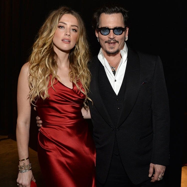 Amber Heard và chồng cũ Johnny Depp có cuộc hôn nhân đầy ồn ào. Ảnh: Xinhua