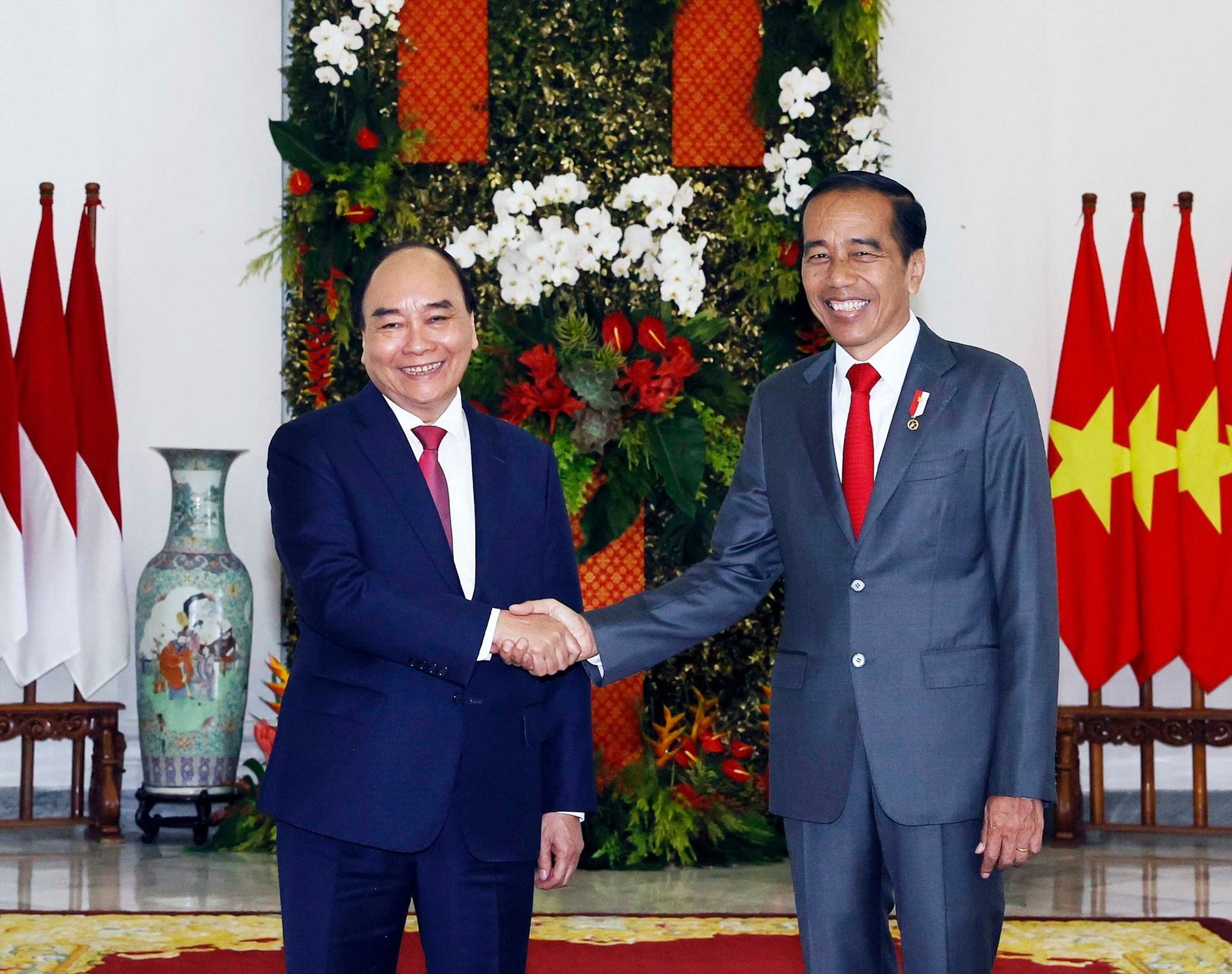 Chủ tịch nước Nguyễn Xuân Phúc và Tổng thống Indonesia Joko Widodo. Ảnh: TTXVN