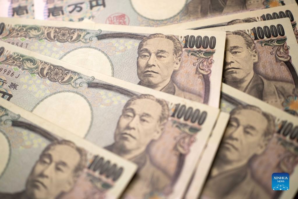 Đồng Yên Nhật đang yếu thế hơn đồng USD. Ảnh: Xinhua