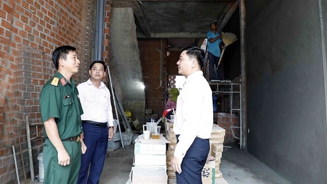 Nguồn vốn cho vay nhà ở xã hội đã giúp gia đình anh Lê Nam Đô, thị trấn an Lão thực hiện ước mơ “an cư”. Ảnh: Bình Nhi