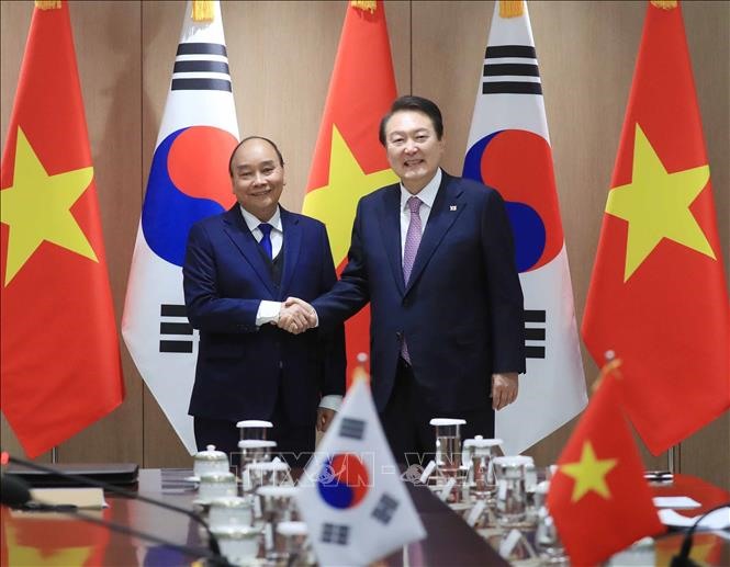 Chủ tịch nước Nguyễn Xuân Phúc và Tổng thống Yoon Suk-yeol tại buổi hội đàm. Ảnh: TTXVN
