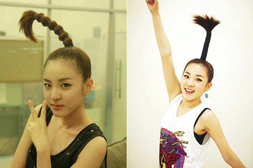 Tóc cây dừa của Dara (2NE1) là một trong những kiểu tóc độc, lạ nhất mà nữ thần tượng từng để. Để giữ được kiểu tóc này, stylist phải buộc tóc của Dara chặt đến mức cô nghĩ da đầu Dara sắp rách. Ảnh: Allkpop