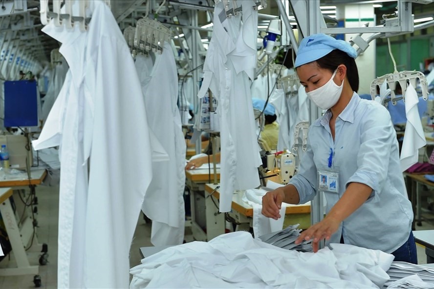 Dệt may là một trong những ngành sử dụng nhiều nguyên liệu nhập khẩu từ Trung Quốc. Ảnh minh họa: Ngọc Hân
