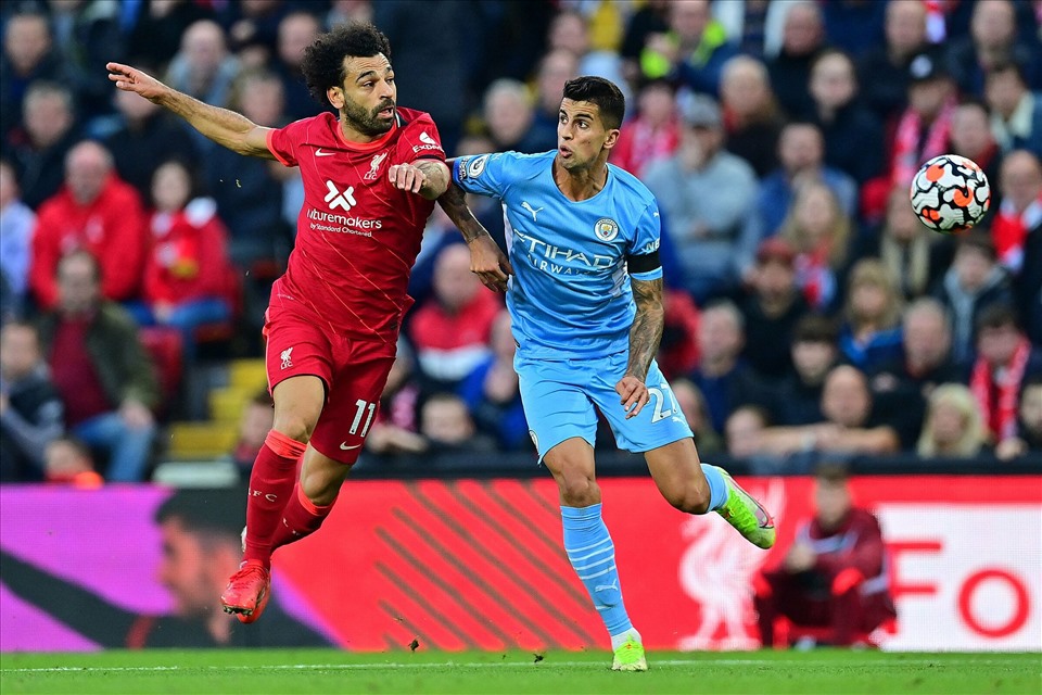 Trận đấu giữa Man City và Liverpool được đánh giá hay nhất bóng đá Anh lúc này. Ảnh: AFP