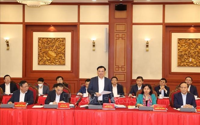 Ông Đinh Tiến Dũng, Ủy viên Bộ Chính trị, Bí thư Thành ủy Hà Nội phát biểu tại buổi họp. Ảnh: Trí Dũng/TTXVN