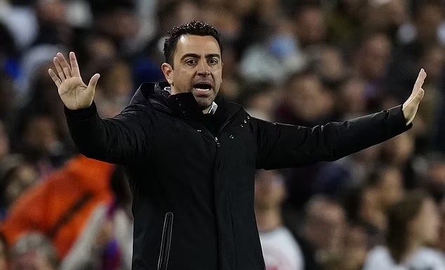 Xavi nhận một cú sốc quá lớn. Ảnh: AFP