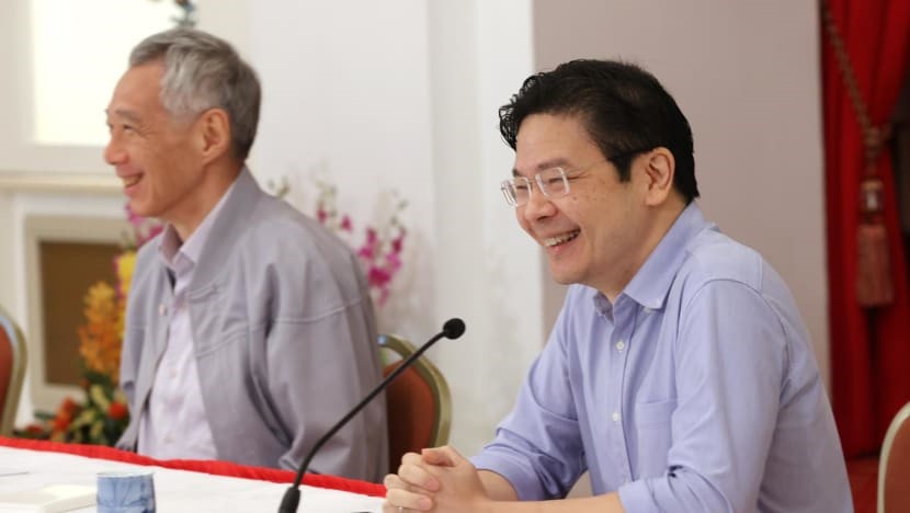 Bộ trưởng Tài chính Lawrence Wong (trái) là người kế nhiệm Thủ tướng Singapore Lý Hiển Long. Ảnh: Bộ Thông tin và Truyền thông Singapore