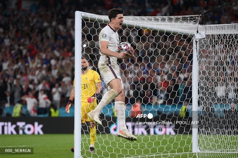 Maguire trở về Manchester United sau khi cùng đội tuyển Anh đi tới trận đấu cuối cùng của Euro 2020.  Ảnh: AFP