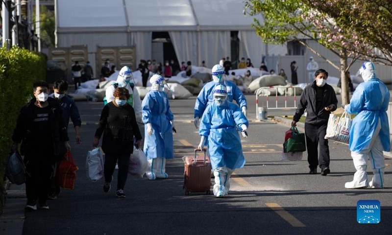 Patients who recovered from COVID-19 were discharged from a makeshift hospital in Shanghai.  Photo: Xinhua