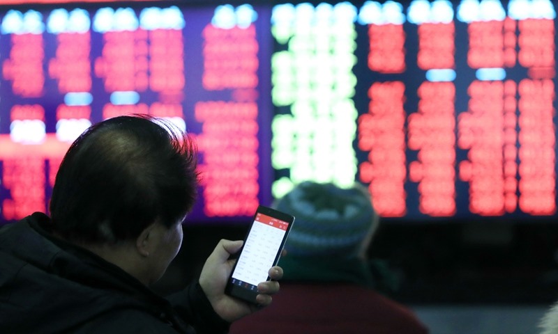 Dữ liệu từ chính phủ Trung Quốc cho thấy số lượng lớn các nhà đầu tư nước ngoài rút khỏi thị trường trái phiếu. Ảnh: Xinhua