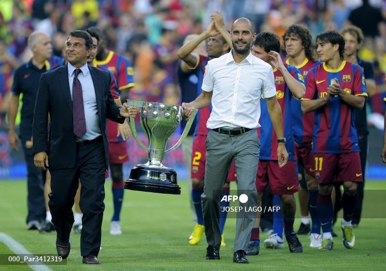 Pep Guardiola đã nổi lên với lối đá Tiqui-Taka ở Barcelona.  Ảnh: AFP