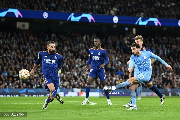 Bernardo Silva chớp thời cơ để hướng Man City đến trận thắng cách biệt 2 bàn... Ảnh: AFP