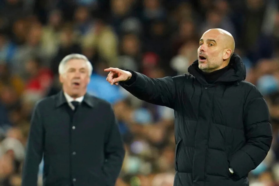 Pep Guardiola khẳng định không thủ hòa trước Real Madrid. Ảnh: AFP.