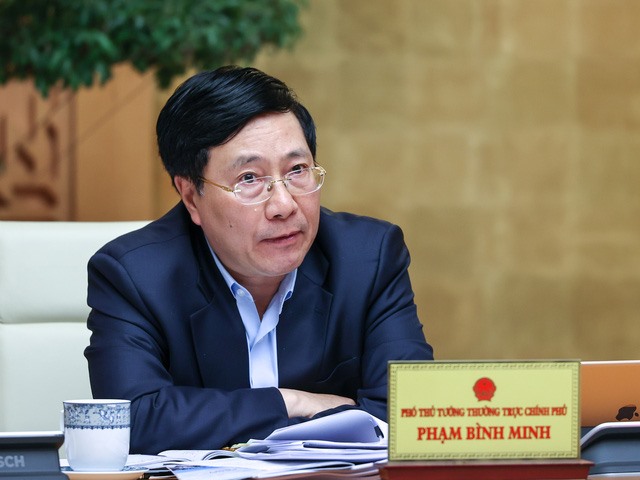 Phó Thủ tướng Thường trực Chính phủ Phạm Bình Minh dự cuộc họp. Ảnh: Nhật Bắc