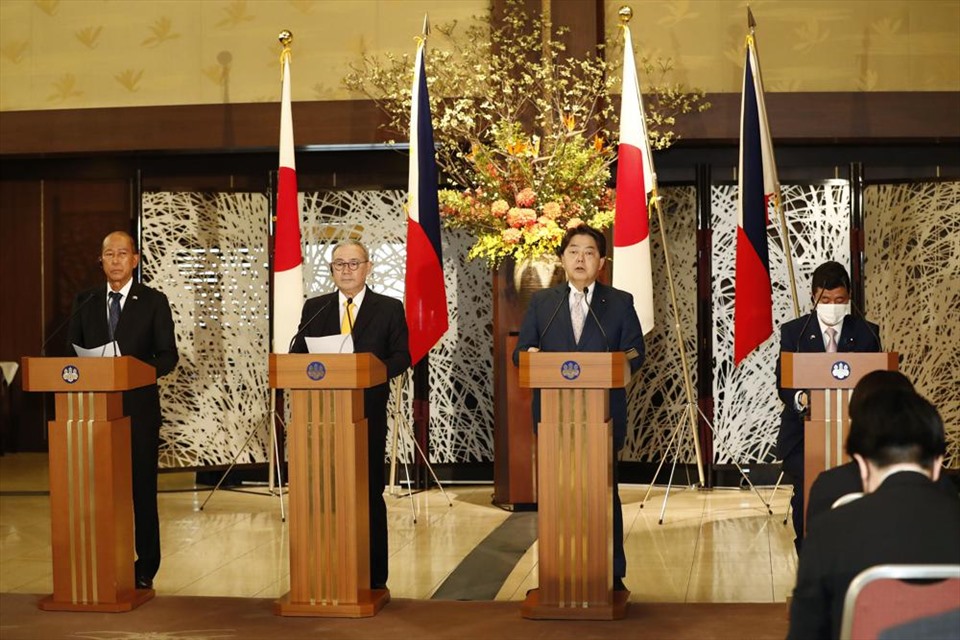 From left to right: Philippine Defense Secretary Delfin Lorenzana, Philippine Foreign Secretary Teodoro Locsin Jr., Japanese Foreign Minister Yoshimasa Hayashi and Japanese Defense Minister Nobuo Kishi during a news conference in Tokyo on April 9.  Screenshots