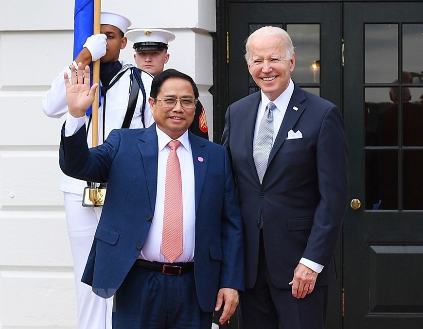 Tổng thống Mỹ Jose Biden đón Thủ tướng Phạm Minh Chính. Ảnh: TTXVN