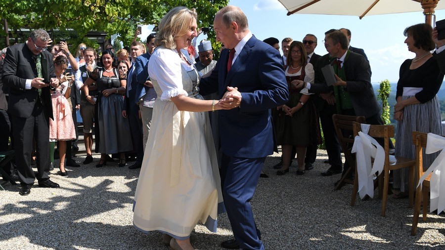 Russian President Vladimir Putin attends the wedding of the Austrian Foreign Minister in 2018. Screenshot