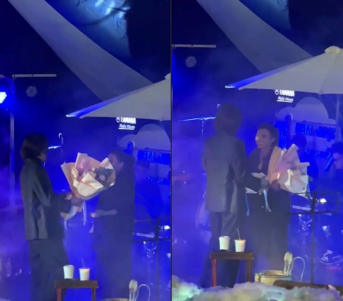 Anh bước lên sân khấu tặng hoa và ôm chặt nữ ca sĩ khiến cô không giấu nổi niềm hạnh phúc. Ảnh cắt từ clip