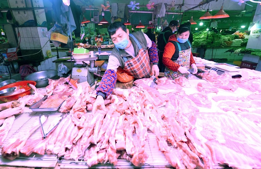 Giá thịt lợn. Ảnh: Xinhua