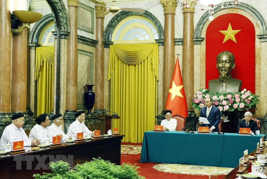 Hình ảnh Chủ tịch nước Nguyễn Xuân Phúc phát biểu tại buổi tiếp chức sắc các Hội thánh và Tổ chức Cao Đài. (Ảnh: Thống Nhất/TTXVN)