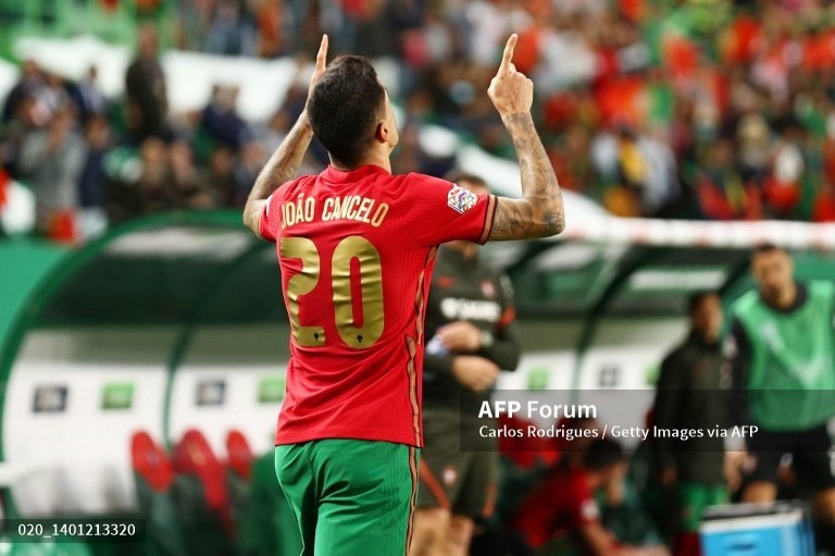 Cancelo ấn định chiến thắng cho Bồ Đào Nha.  Ảnh: AFP