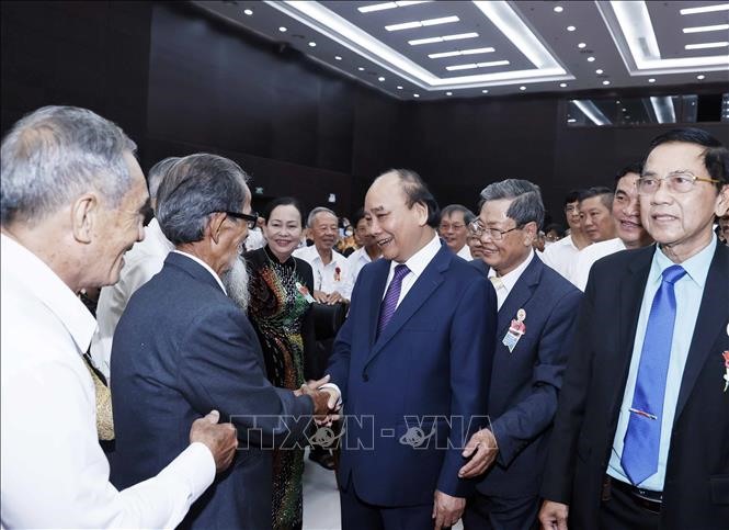 Chủ tịch nước Nguyễn Xuân Phúc và các đại biểu tham dự buổi lễ. Ảnh: Thống Nhất/TTXVN