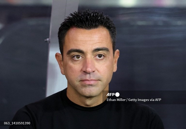 Xavi cũng không giấu giếm ý định muốn tái hợp với người đồng đội cũ. Ảnh: AFP