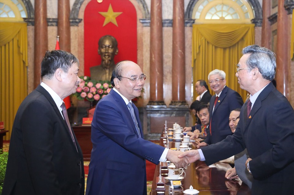 Chủ tịch nước Nguyễn Xuân Phúc cùng đại biểu tham dự. Ảnh: VPCTN