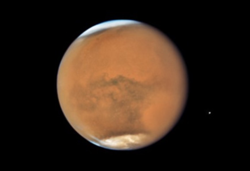 Kính viễn vọng không gian Hubble của NASA chụp ảnh sao Hỏa vào ngày 18.7.2018, ghi lại cơn bão bụi bao trùm cả hành tinh đỏ. Ảnh: NASA
