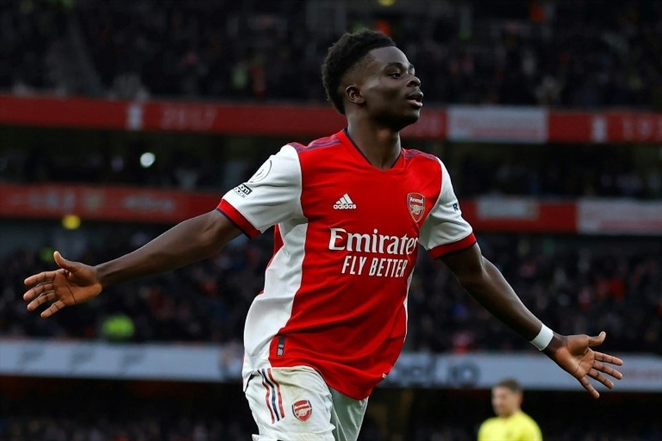 Saka trở thành trụ cột của Arsenal mùa giải 2021-22. Ảnh: AFP.