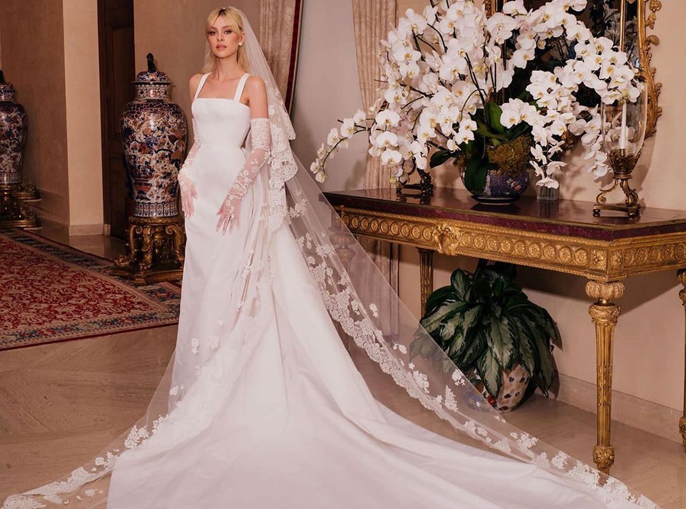 Nicola Peltz lựa chọn mẫu váy cưới đến từ thương hiệu nổi tiếng Valentino. Ảnh: Xinhua