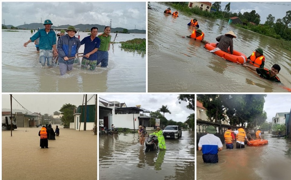 Cán bộ, chiến sĩ Công an huyện Quỳnh Lưu giúp đỡ người dân và phương tiện di chuyển qua các tuyến đường bị ngập sâu. Ảnh: Quỳnh Trang