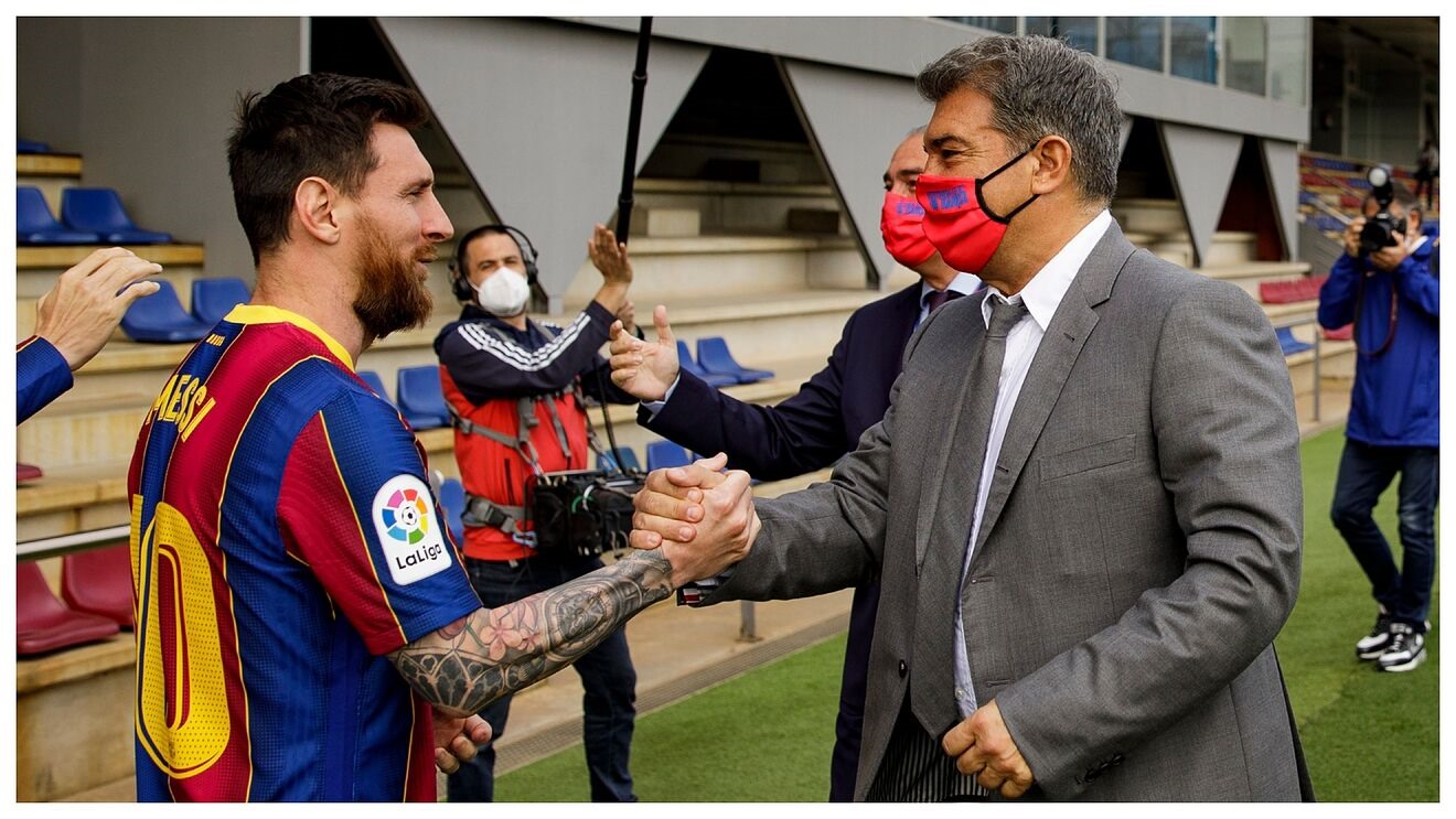 Messi và Laporta không còn giữ được mối quan hệ thân thiết.  Ảnh: AFP