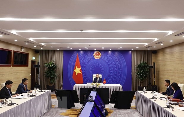 Chủ tịch nước Nguyễn Xuân Phúc chia sẻ một số đề xuất cụ thể tại hội nghị ngày 12.1. Ảnh: TTXVN