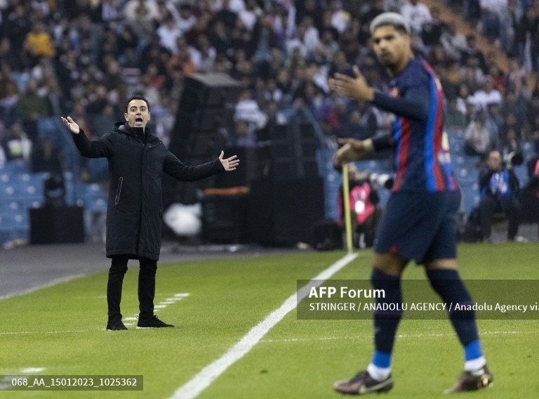 Xavi thể hiện nhiệt huyết và tình yêu với Barcelona.  Ảnh: AFP
