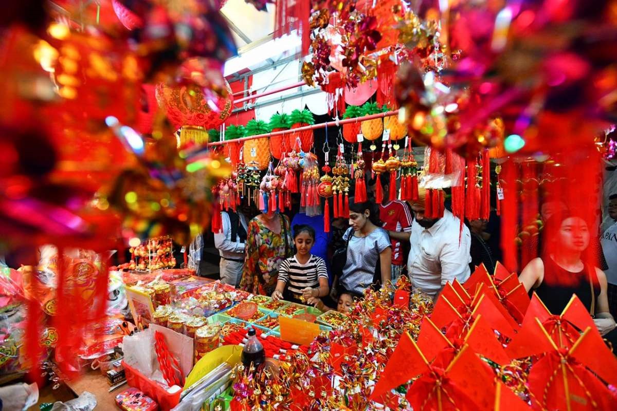 Singapore đón Tết truyền thống giống Việt Nam và Trung Quốc. Ảnh: AFP