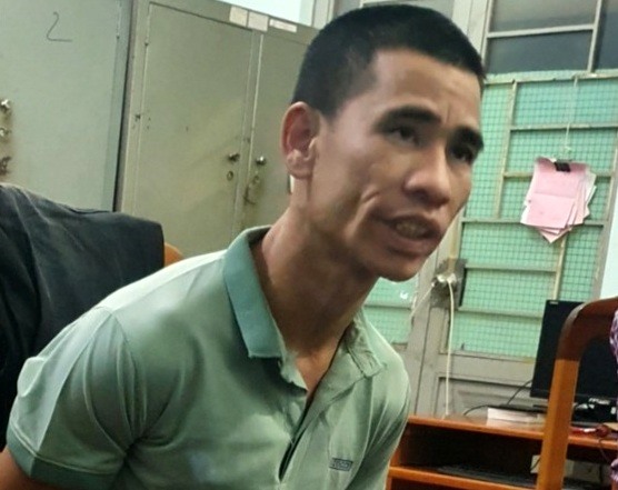 Đối tượng Trương Văn Hải bị công an bắt giữ khi đang lẩn trốn tại Lâm Đồng. Ảnh: Khánh Phúc
