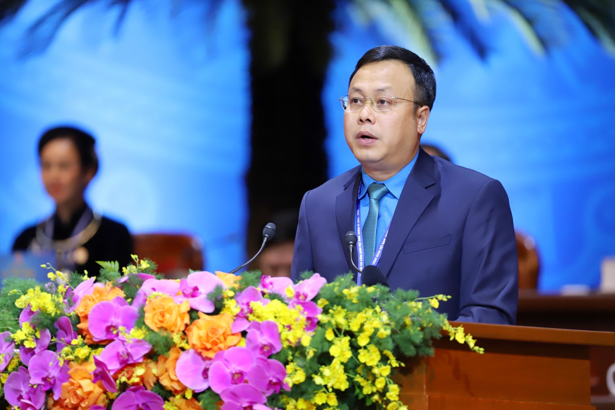 Ông Phạm Quang Thanh, Chủ tịch Liên đoàn Lao động TP Hà Nội trình bày tham luận. Ảnh: Tô Thế