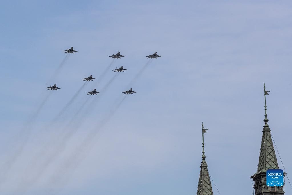 Máy bay chiến đấu MiG-29SMT bay trong buổi diễn tập duyệt binh Ngày Chiến thắng ở Mátxcơva, Nga, ngày 7.5.2022. Ảnh: Xinhua