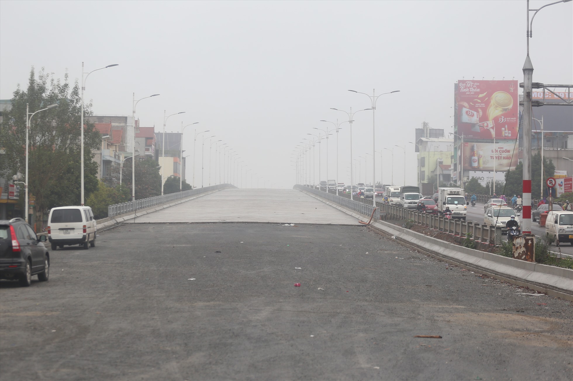 Sau khi hoàn thành giai đoạn 2, Dự án cầu Vĩnh Tuy sẽ có chiều rộng mặt cắt ngang lớn nhất Hà Nội với 8 làn xe ô tô (40m). Ảnh: Vĩnh Hoàng