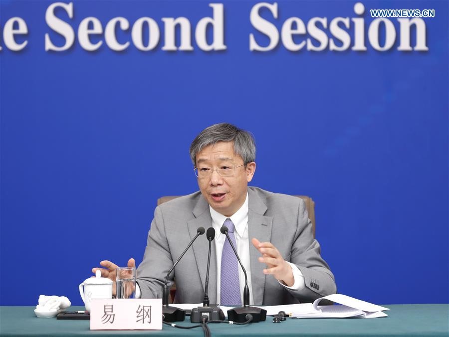 Thống đốc Ngân hàng Nhân dân Trung Quốc Dị Cương họp báo về cải cách và phát triển tài chính cho kỳ họp thứ hai của Đại hội Đại biểu Nhân dân Toàn quốc khoá 13 tại Bắc Kinh, ngày 10.3.2019. Ảnh: Xinhua