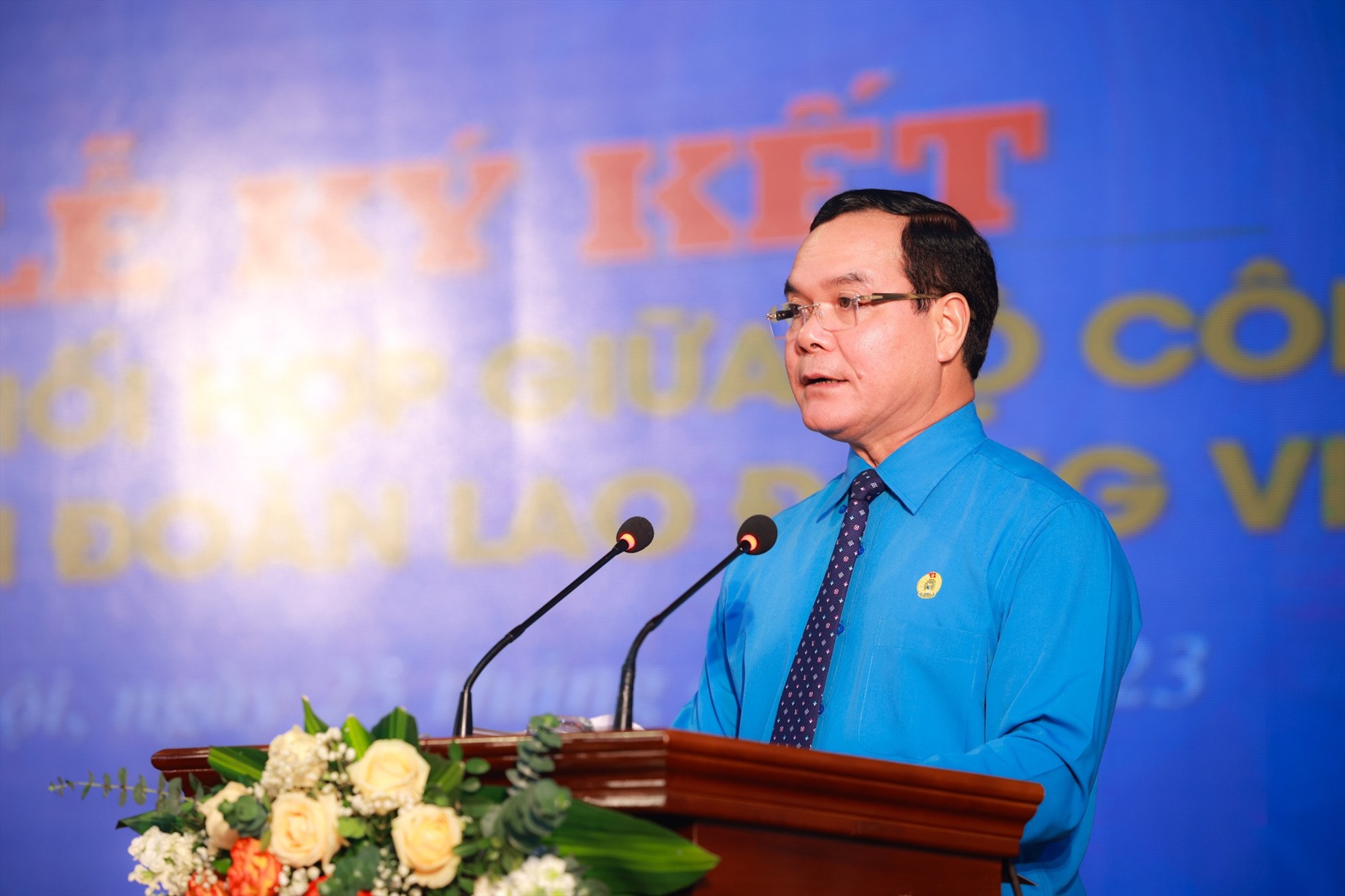 Đồng chí Nguyễn Đình Khang - Chủ tịch Tổng Liên đoàn Lao động Việt Nam - phát biểu tại Lễ ký kết. Ảnh: Hải Nguyễn