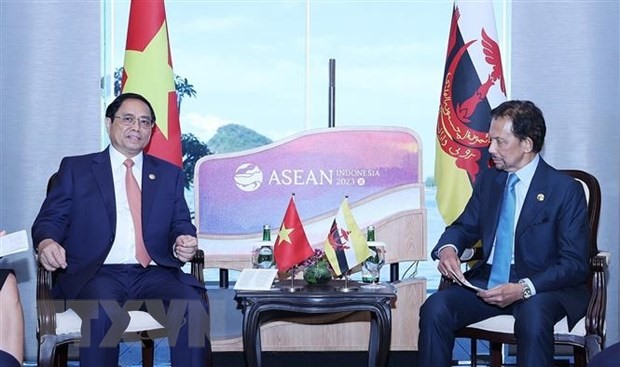 Thủ tướng Phạm Minh Chính gặp Quốc vương Brunei Hassanal Bolkiah. Ảnh: TTXVN