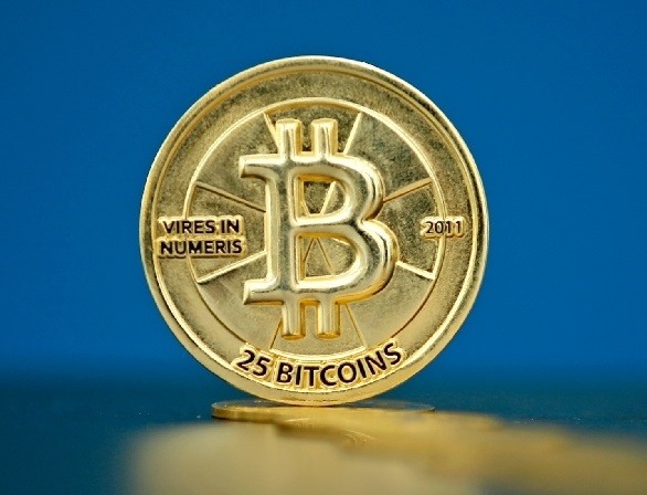 Bitcoin có thể vượt mức trên mốc 30.000 USD hiện tại. Ảnh: Xinhua