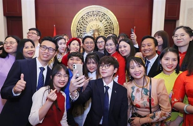 Thủ tướng Chính phủ Phạm Minh Chính với cộng đồng người Việt Nam tại Trung Quốc. Ảnh: TTXVN